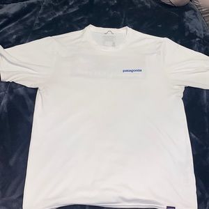 Small white Patagonia Tee Shirt- WILLING TO NEGOTIATE